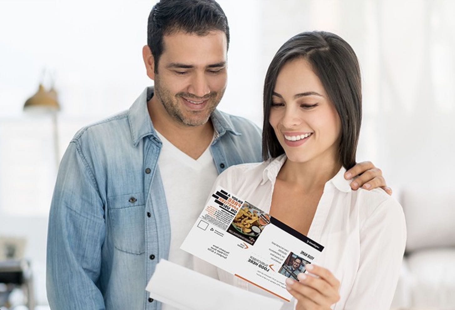 Couple looking at postcards